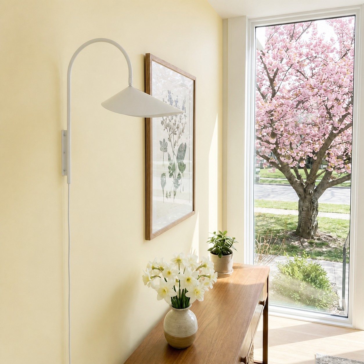 White Arum wall lamp in a bright hallway