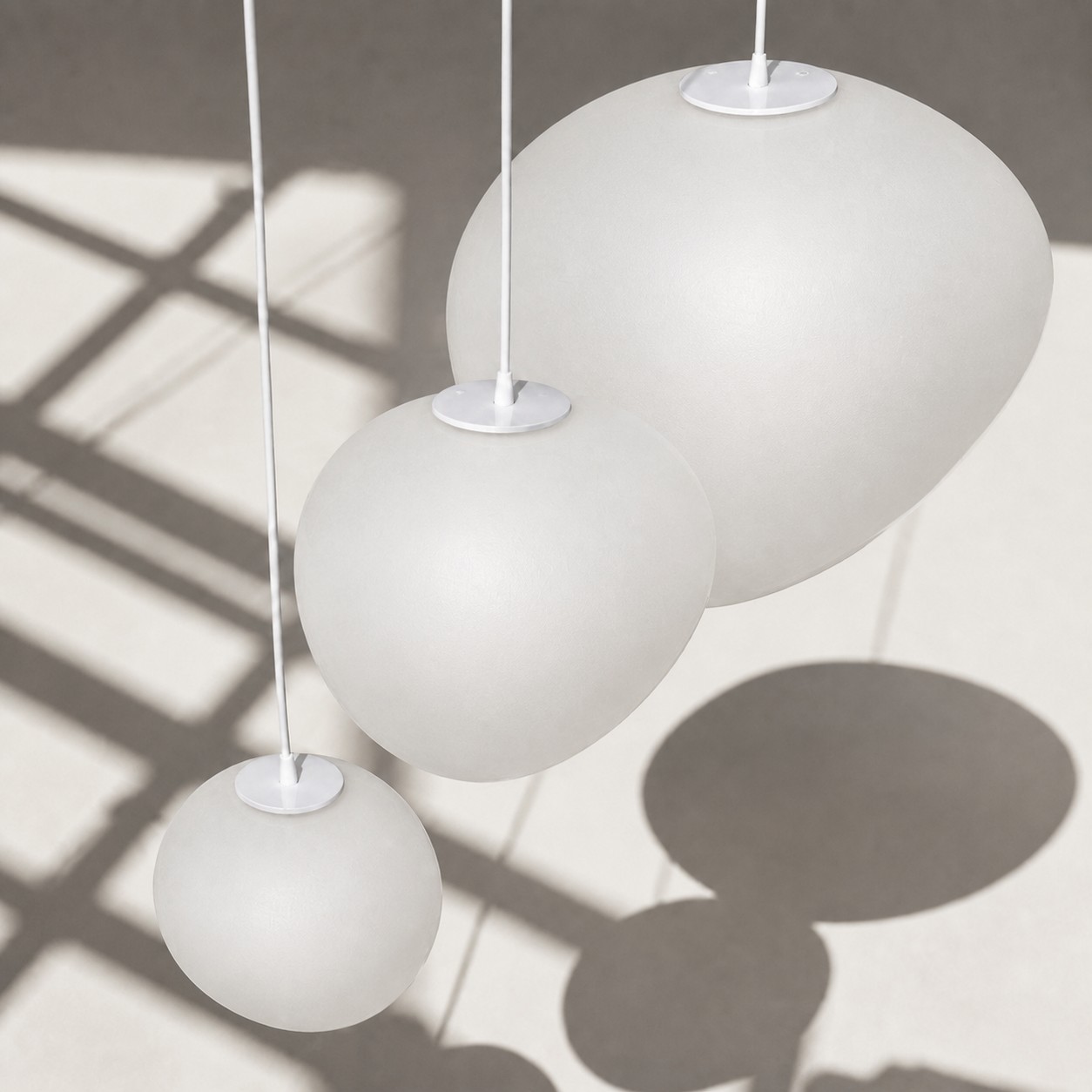 Stonea matte frosted glass pendant lamps in multiple sizes