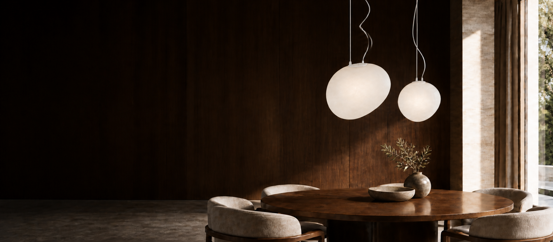 Two Stonea irregular matte frosted glass pendant lamps with twin suspension lines in a dark walnut dining interior