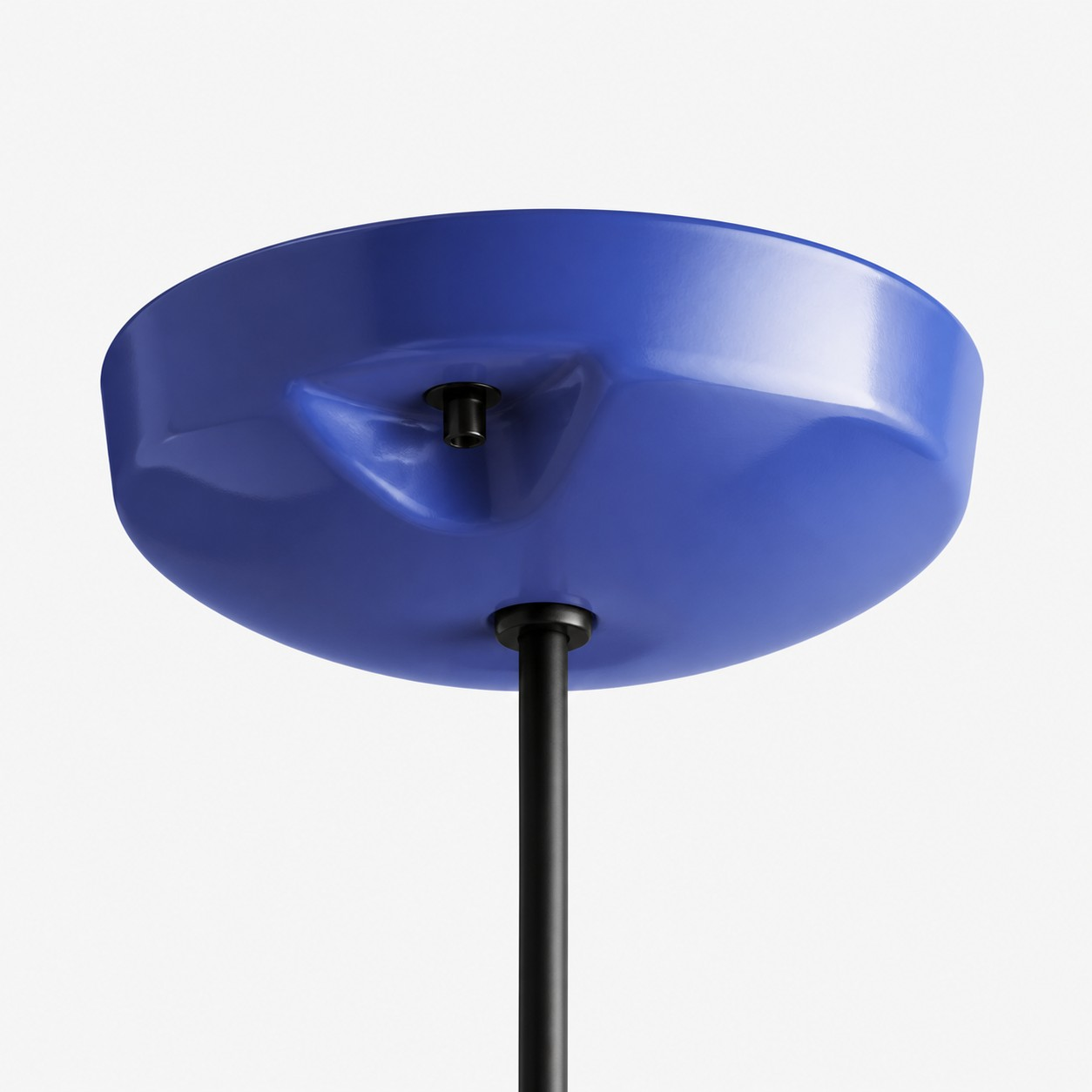 Blue ceramic ceiling canopy and black cable detail