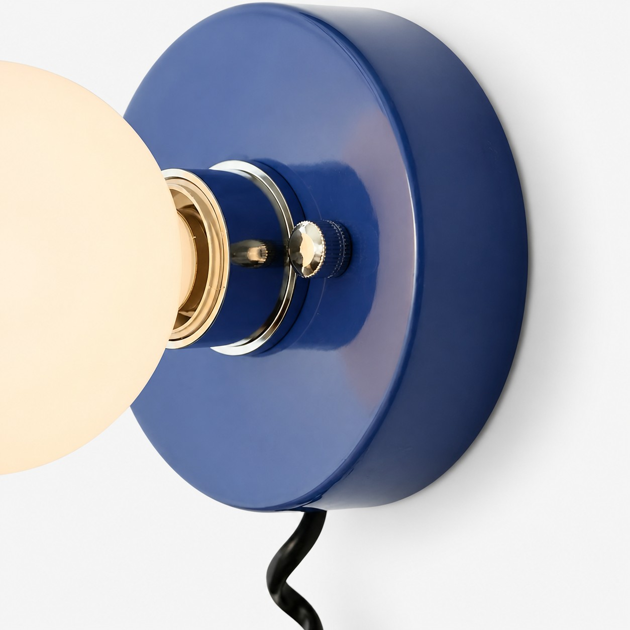 Navy blue painted body and polished metal fitting detail