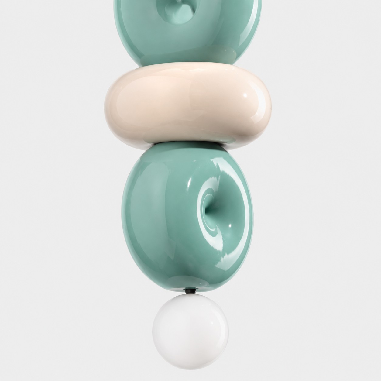 Teal and cream lower ceramic forms with white globe detail