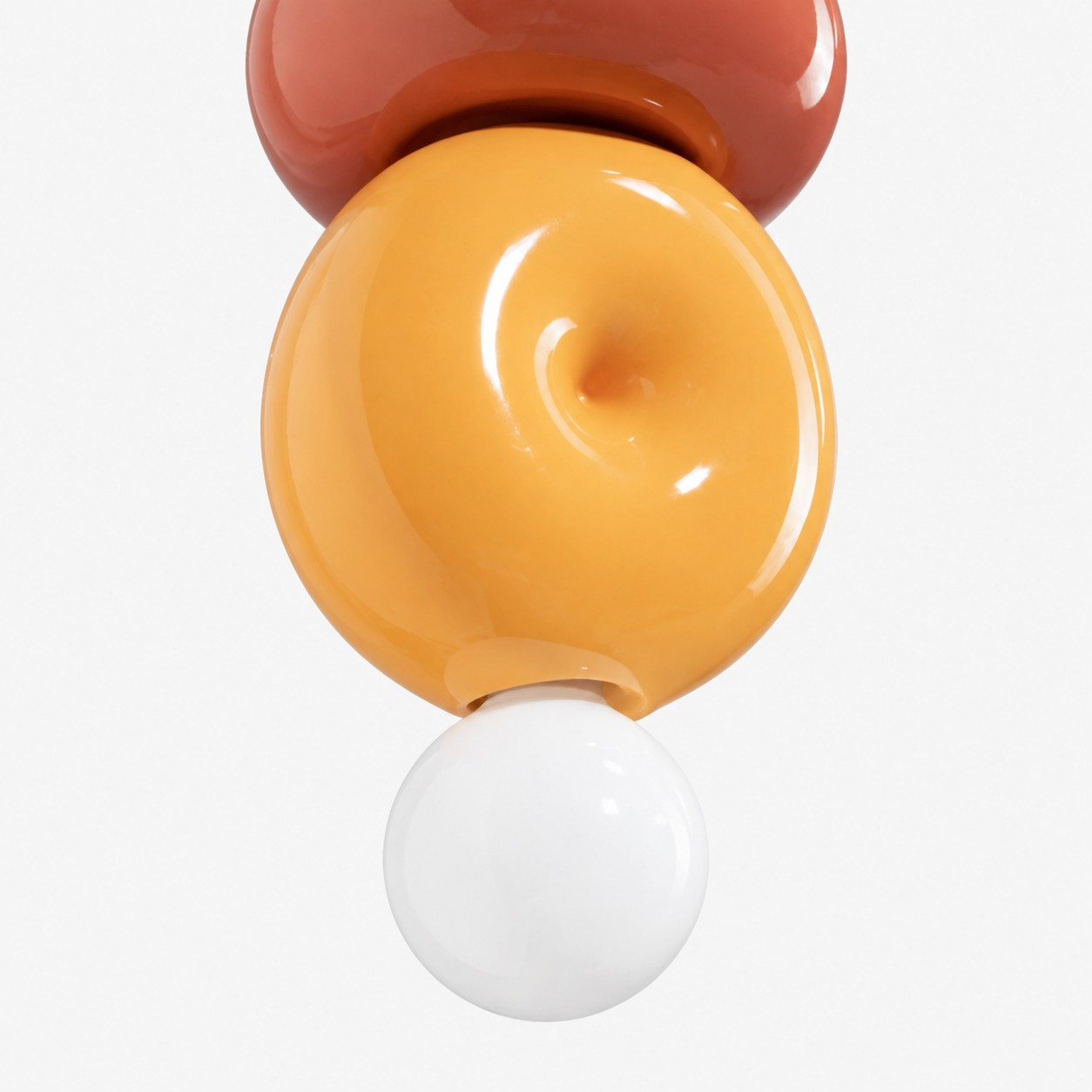 Lower yellow ceramic form and white globe detail