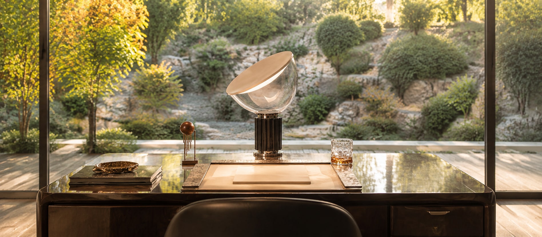 Taccia bowl glass table lamp in a bright modernist living space