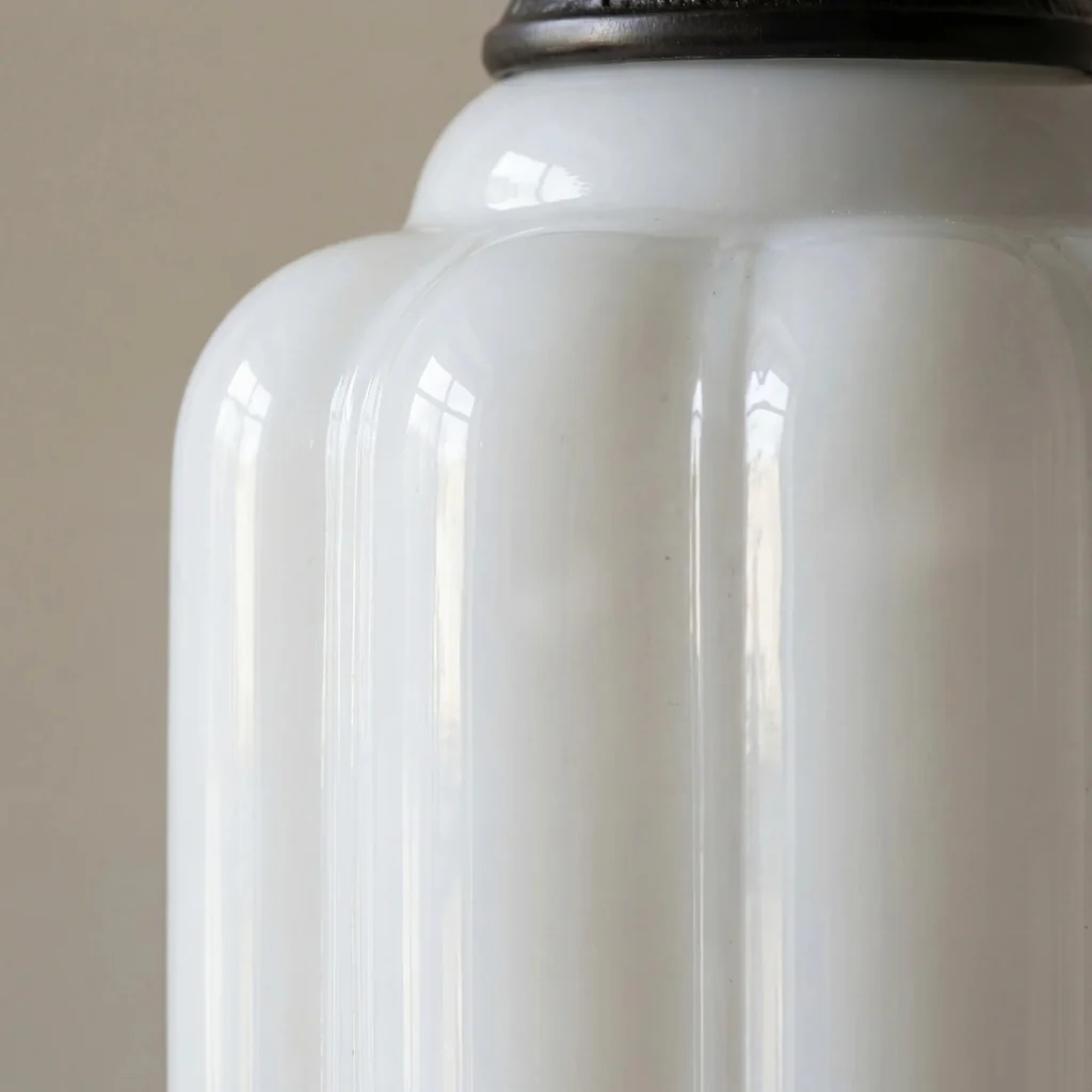 Fluted white glass shade and dark metal top cap