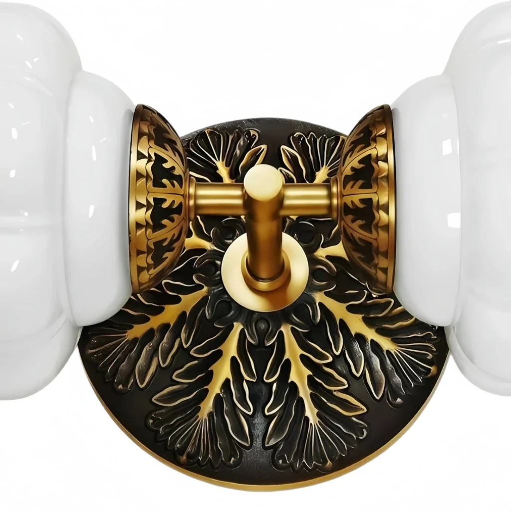 Ornate circular backplate and brass T-arm detail
