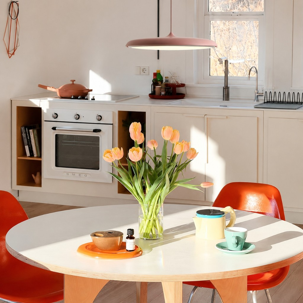 Pink Macaron pendant in a bright kitchen dining area