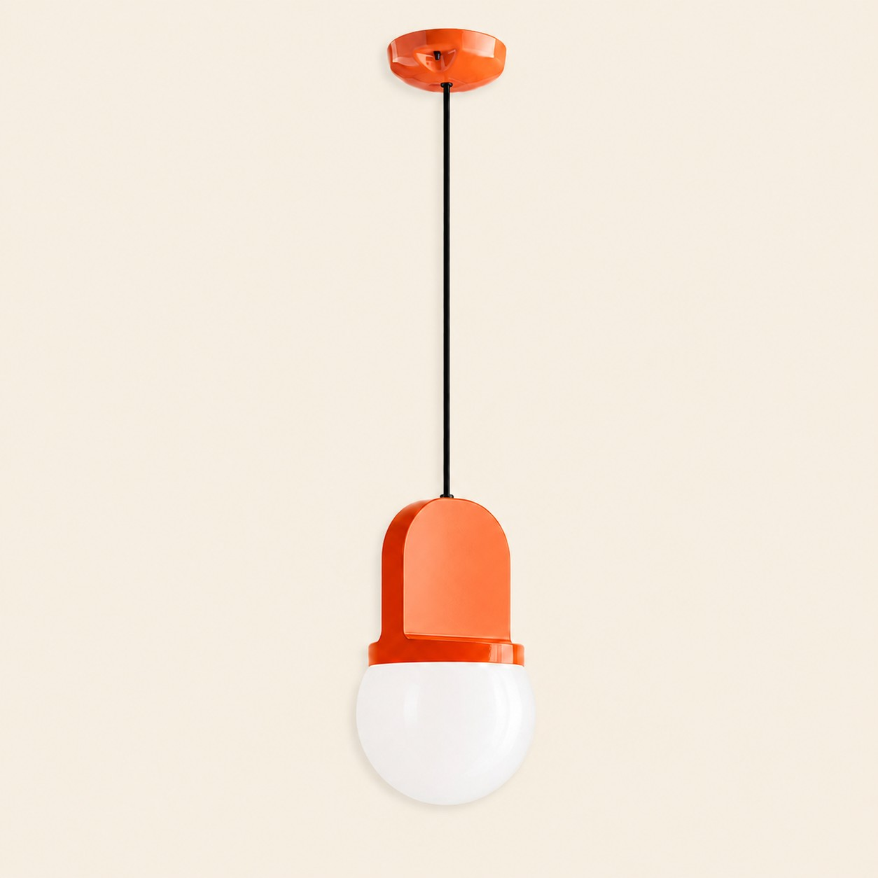 Orange sculptural pendant lamp