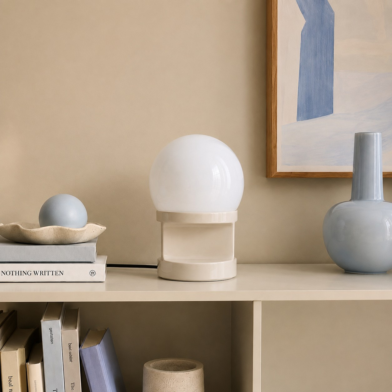 Cream HABEA table lamp on a neutral shelf