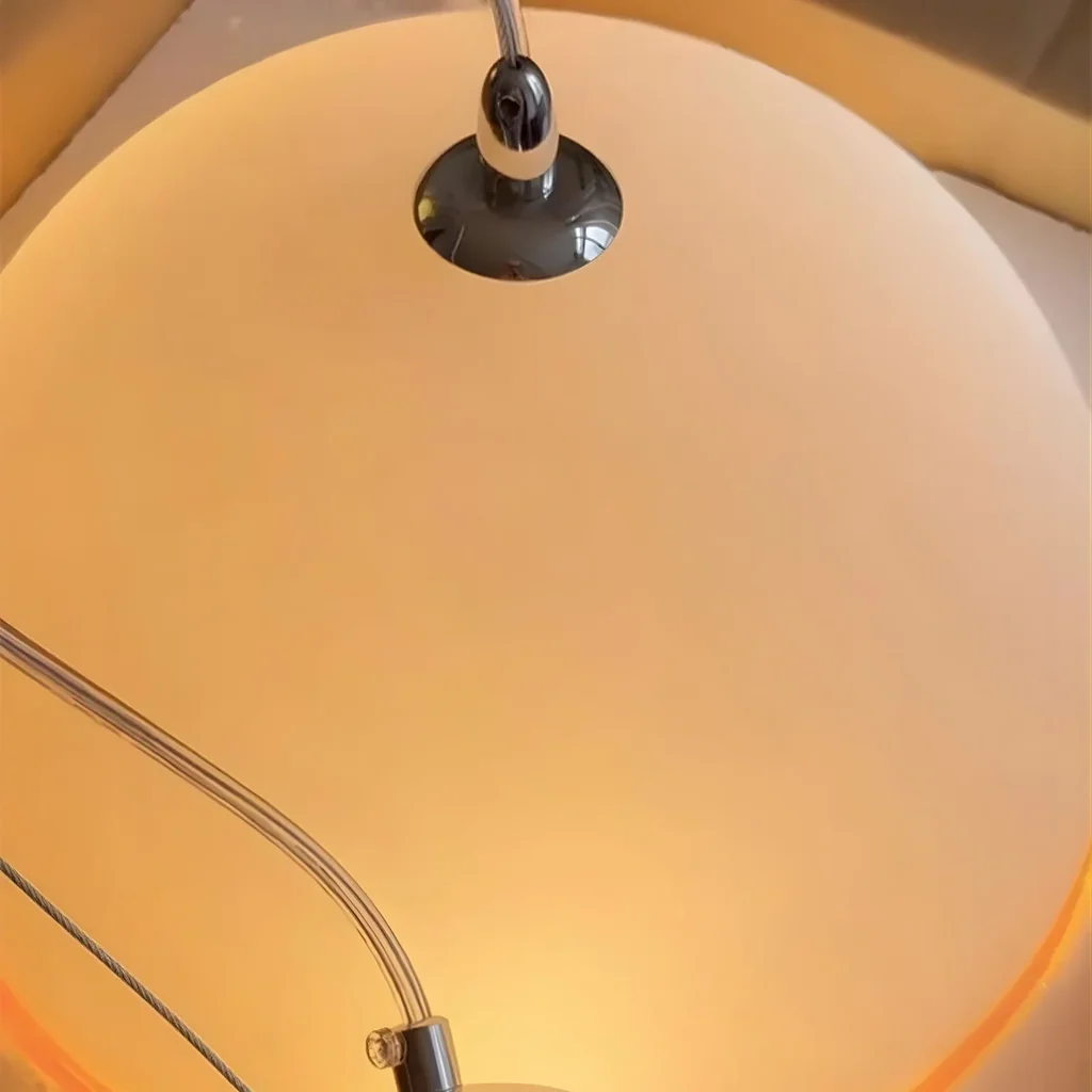 Close detail of the glass dome and suspension