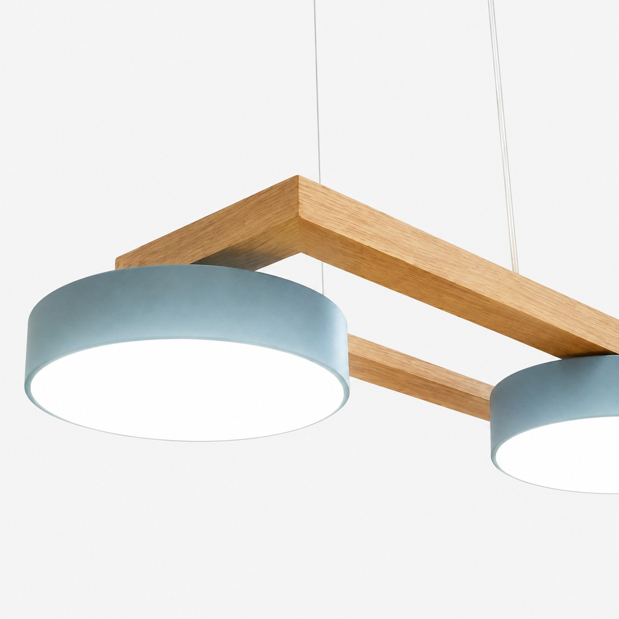 Blue circular LED shade and wooden frame detail