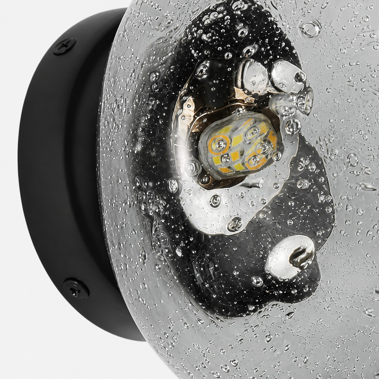 Close-up of the clear bubble crystal and light source