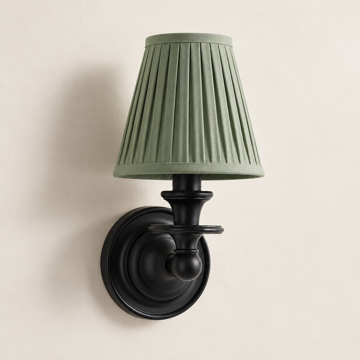Sage Green Pleated Kalvora fabric shade wall sconce in Black