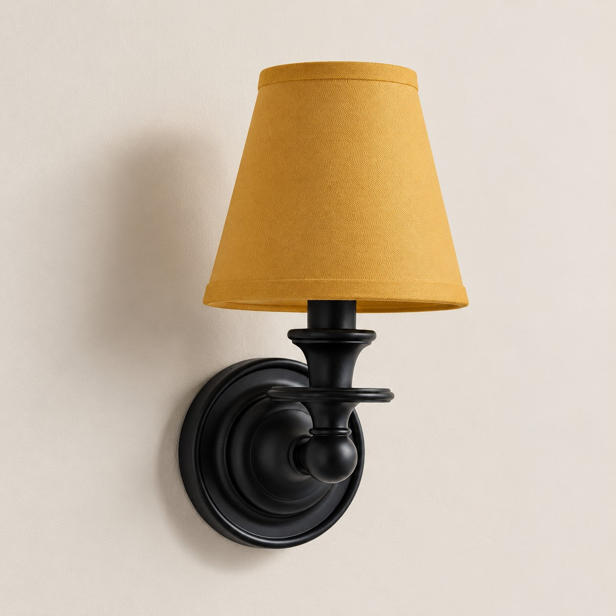 Mustard Yellow Plain Kalvora fabric shade wall sconce in Black