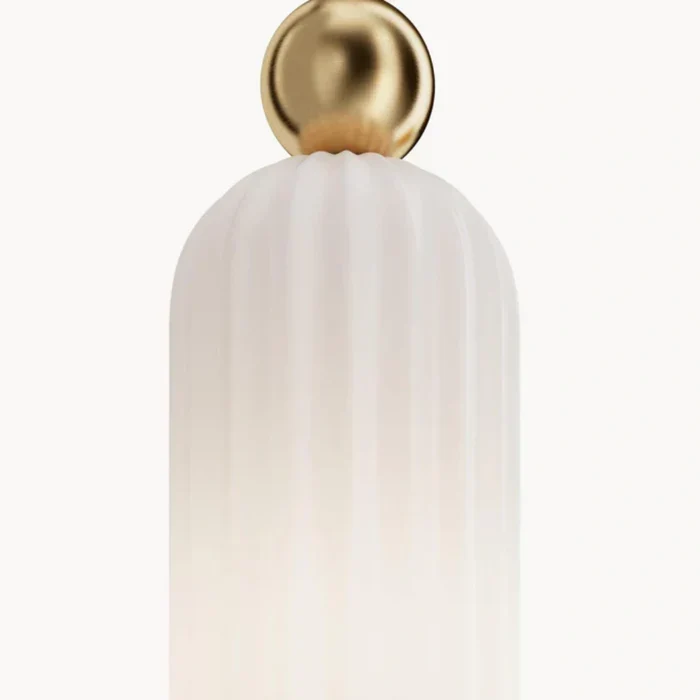 Milk glass cylinder and gold sphere detail