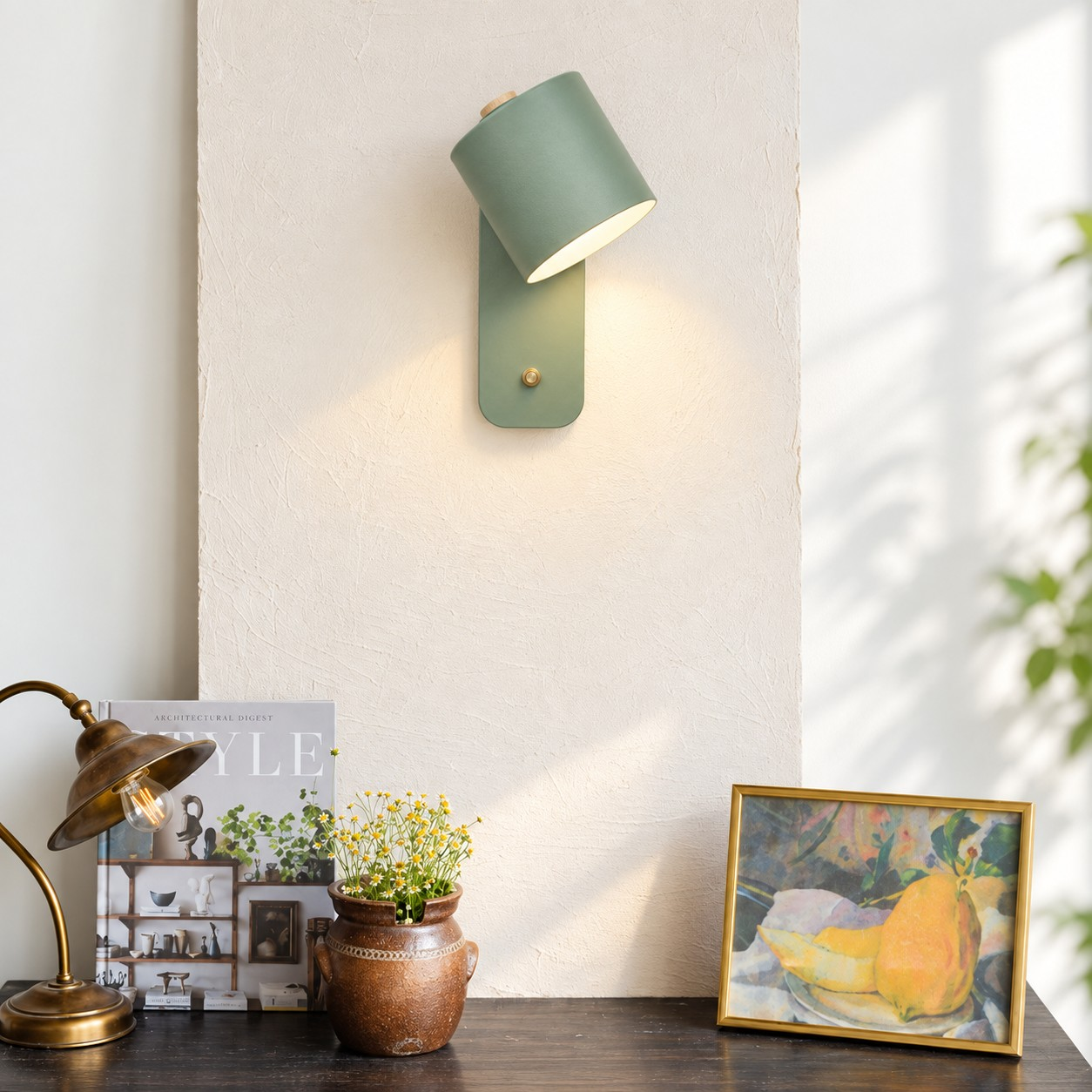Green Proteus wall light above a sideboard