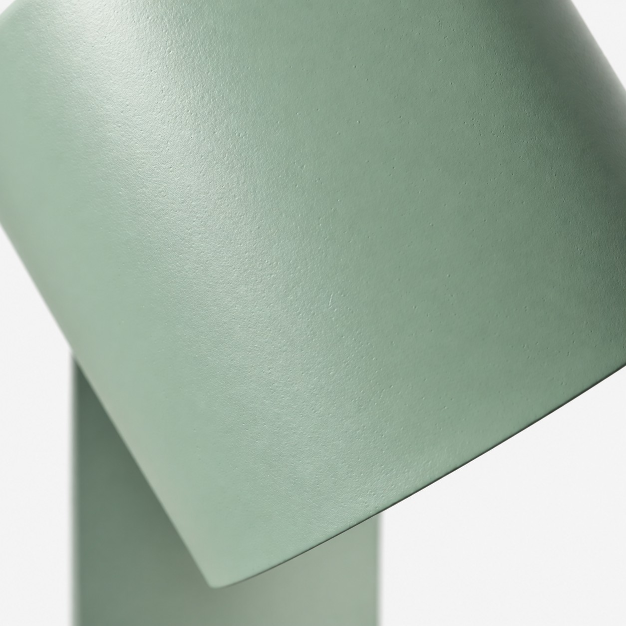 Close-up of the green cylinder shade finish