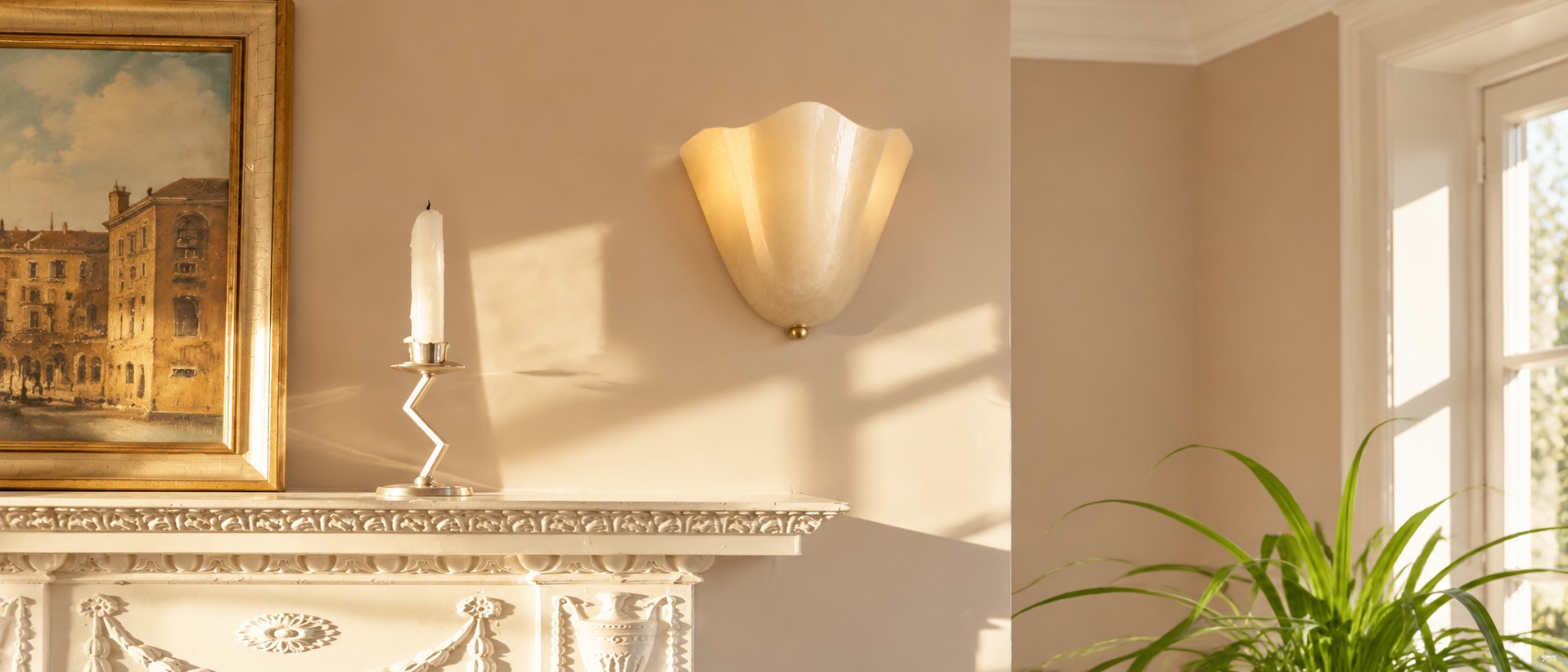 Beige seashell glass wall sconce above a mantel