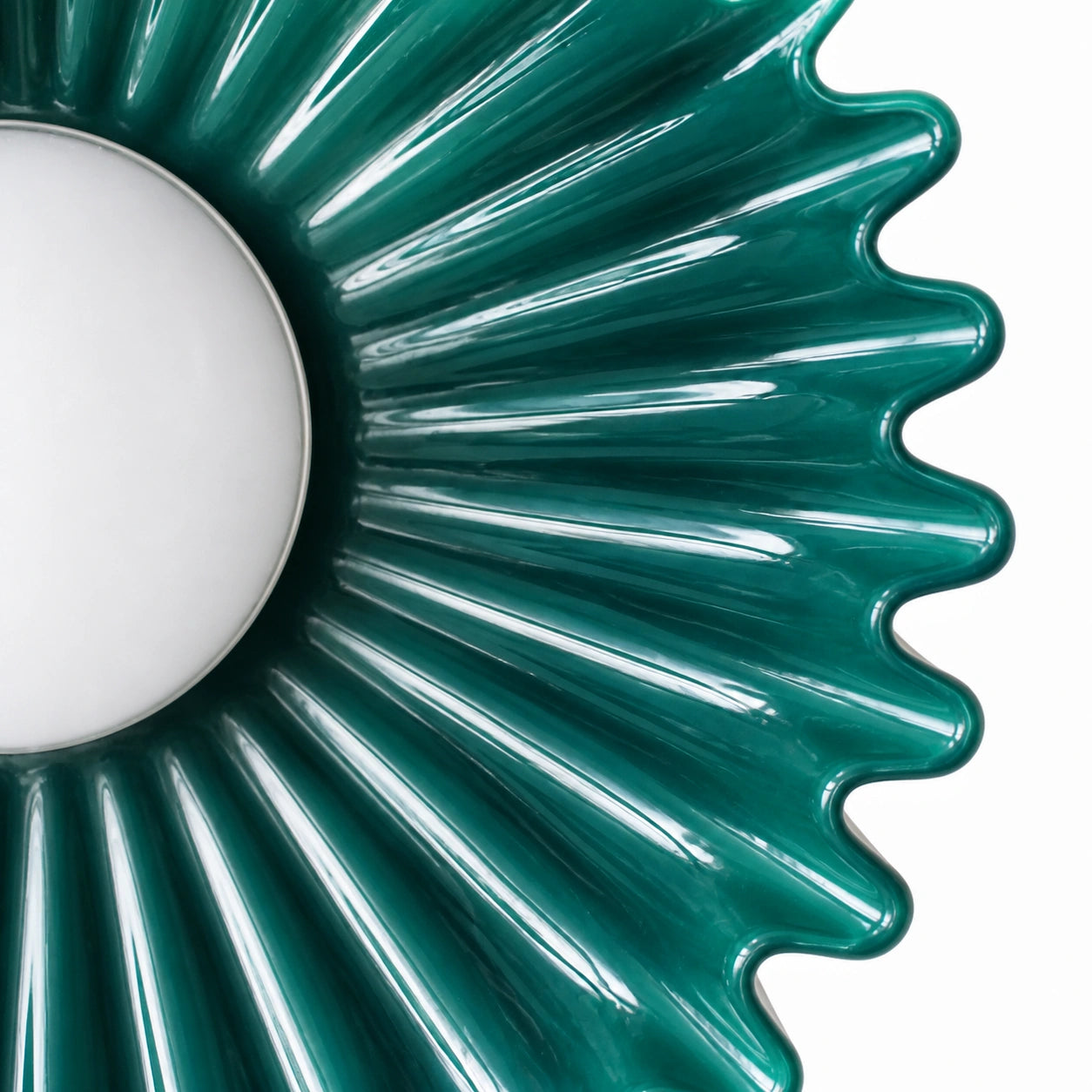 Glazed flutes meeting the acrylic sphere