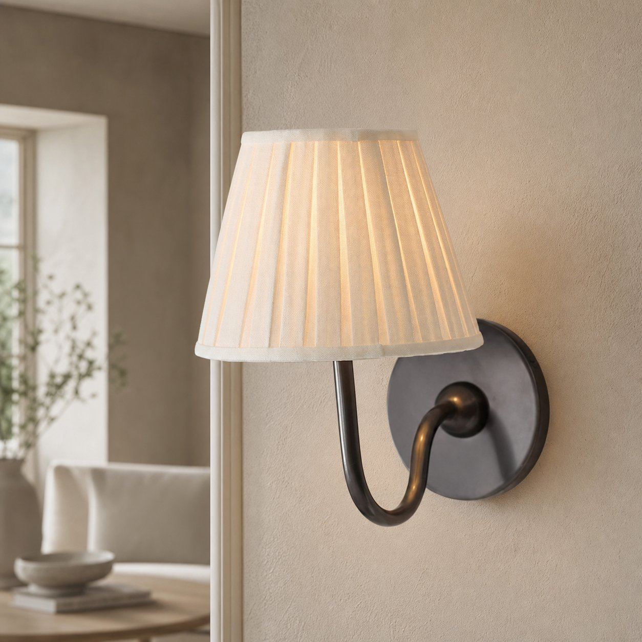 Matte black white pleated 1-Light Luvora wall lamp in an interior