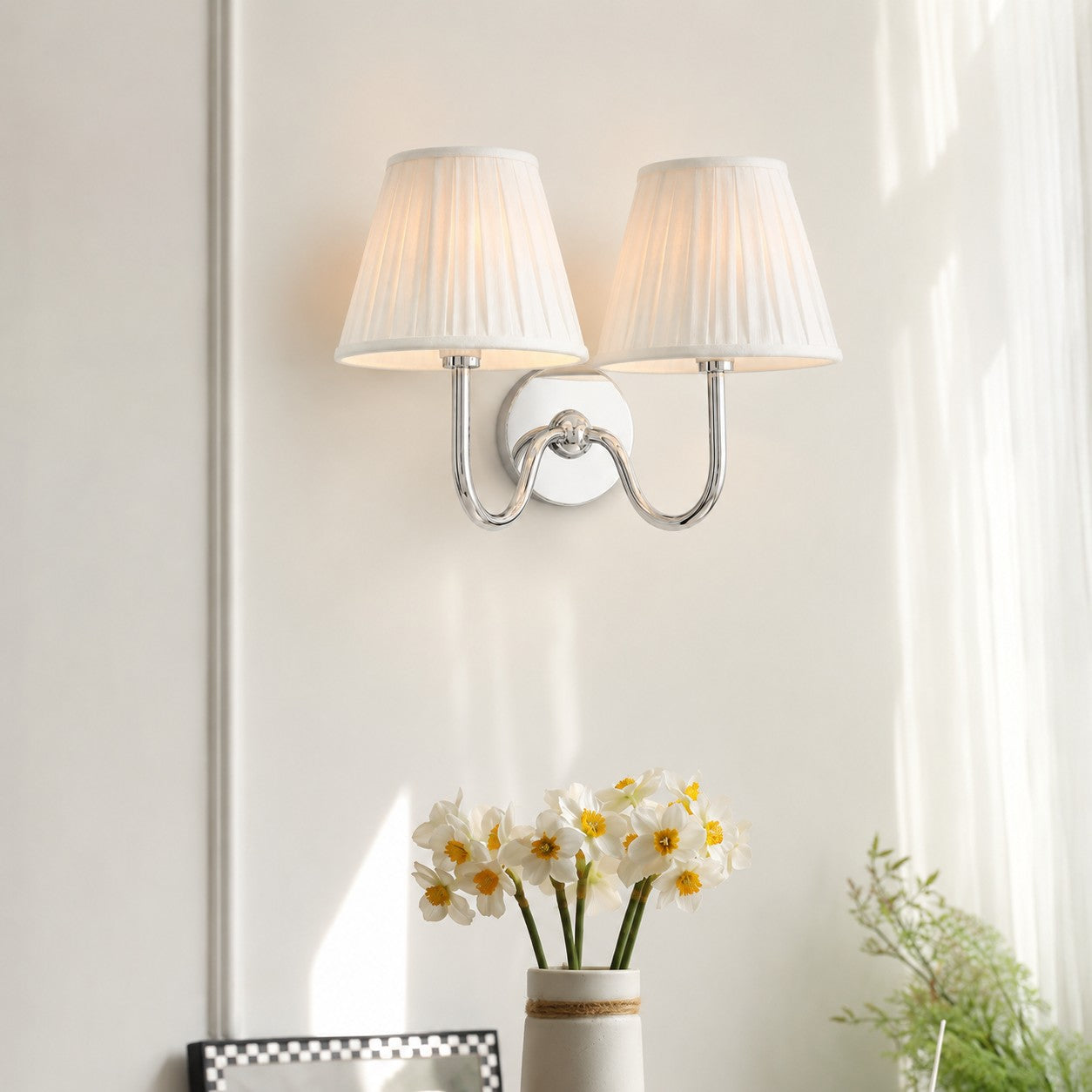 Chrome white pleated 2-Light Luvora wall lamp in an interior