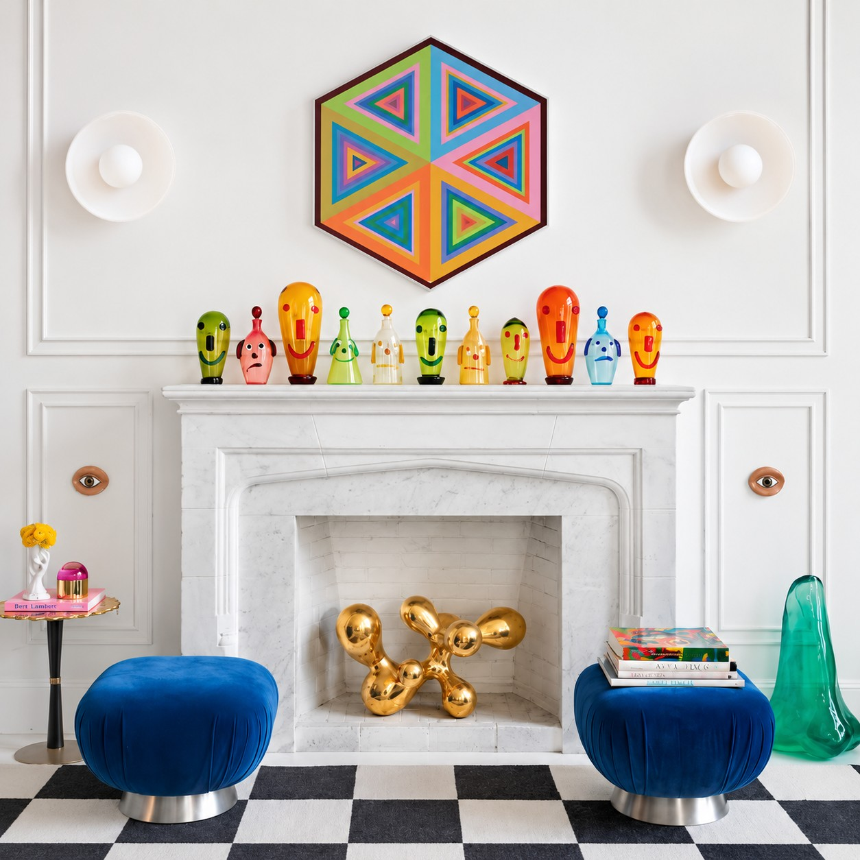 White glass disc wall sconces flanking a fireplace