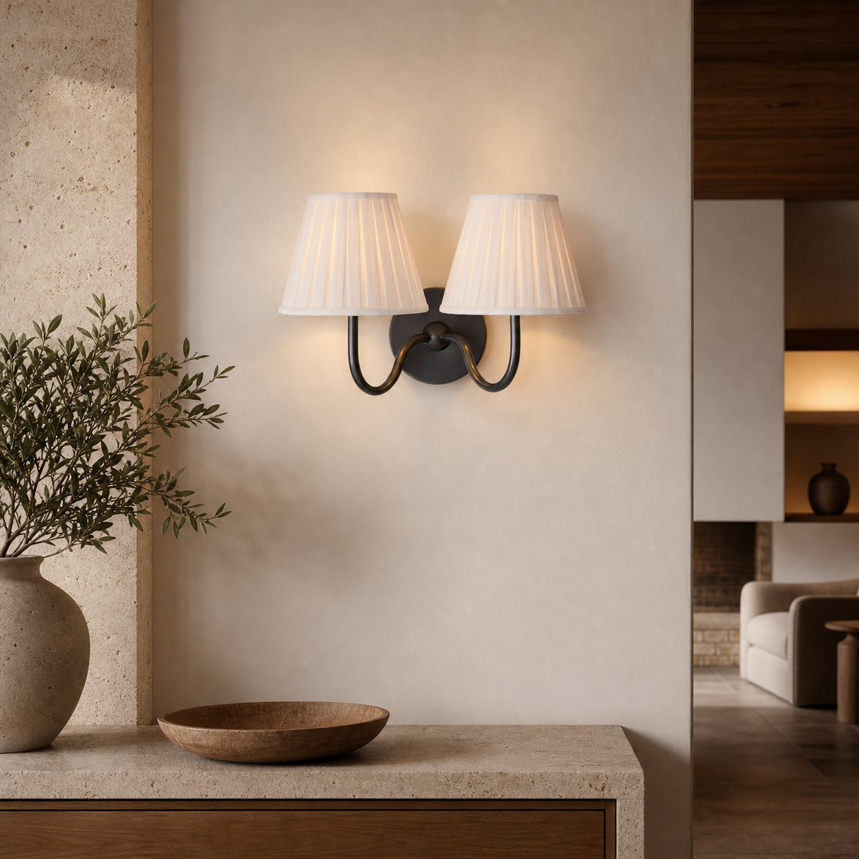 Matte black white pleated 2-Light Luvora wall lamp in an entry