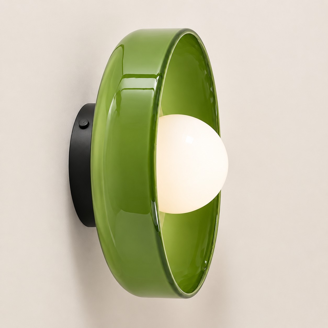 Green glass disc wall sconce