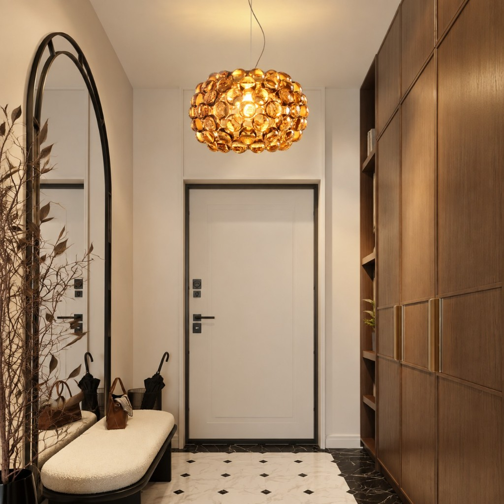 Golden crystal sphere pendant in an entry
