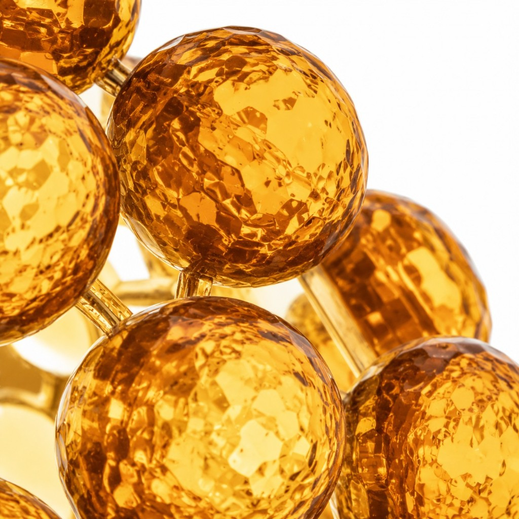 Golden textured crystal sphere close-up