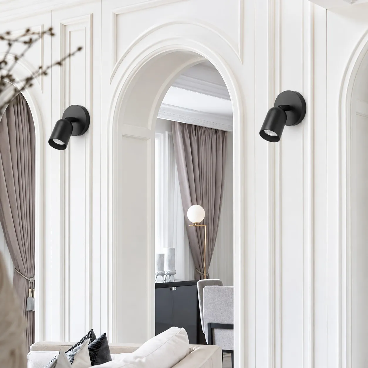 Ares wall light in a bright arched interior