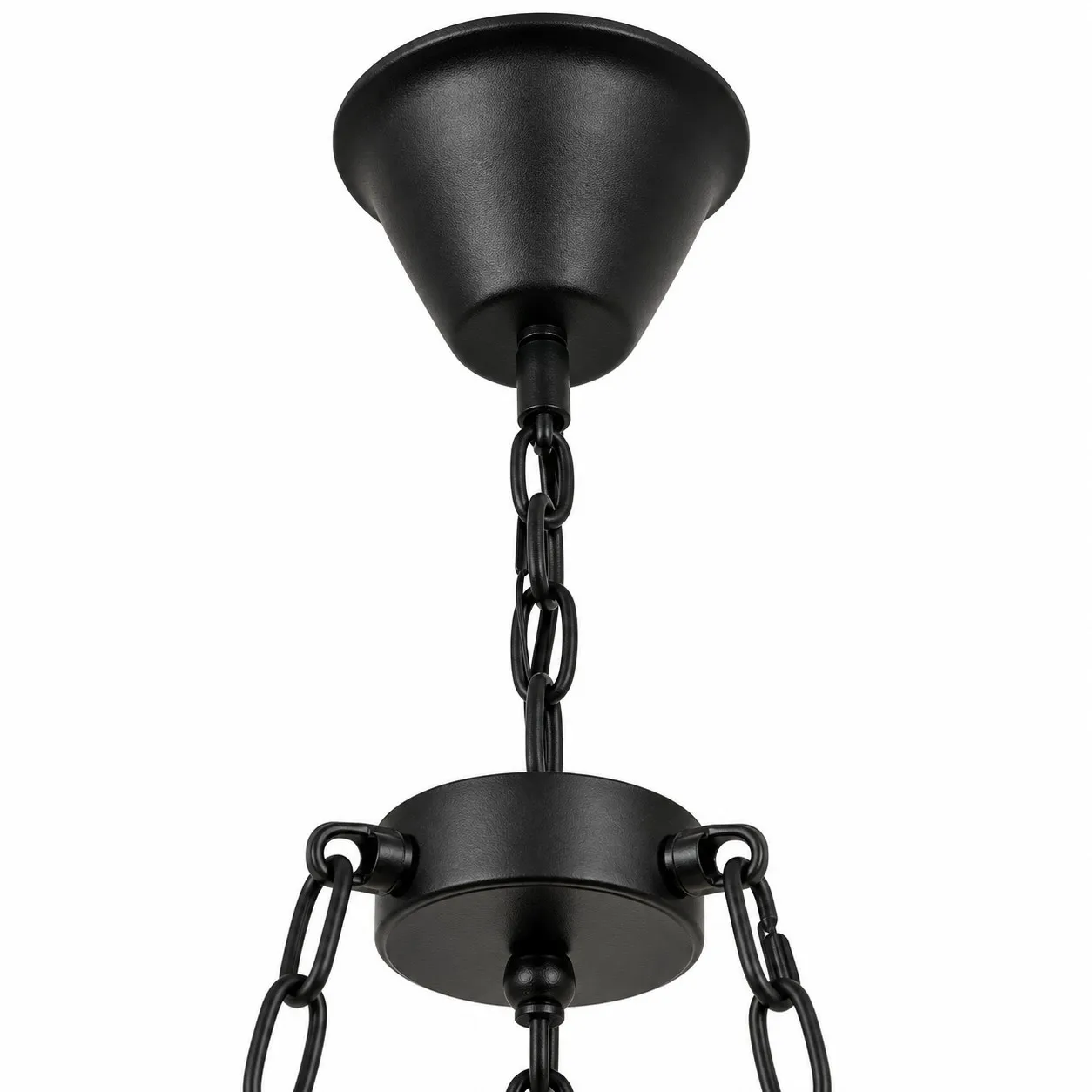 Close-up of black ceiling canopy and adjustable chandelier chain