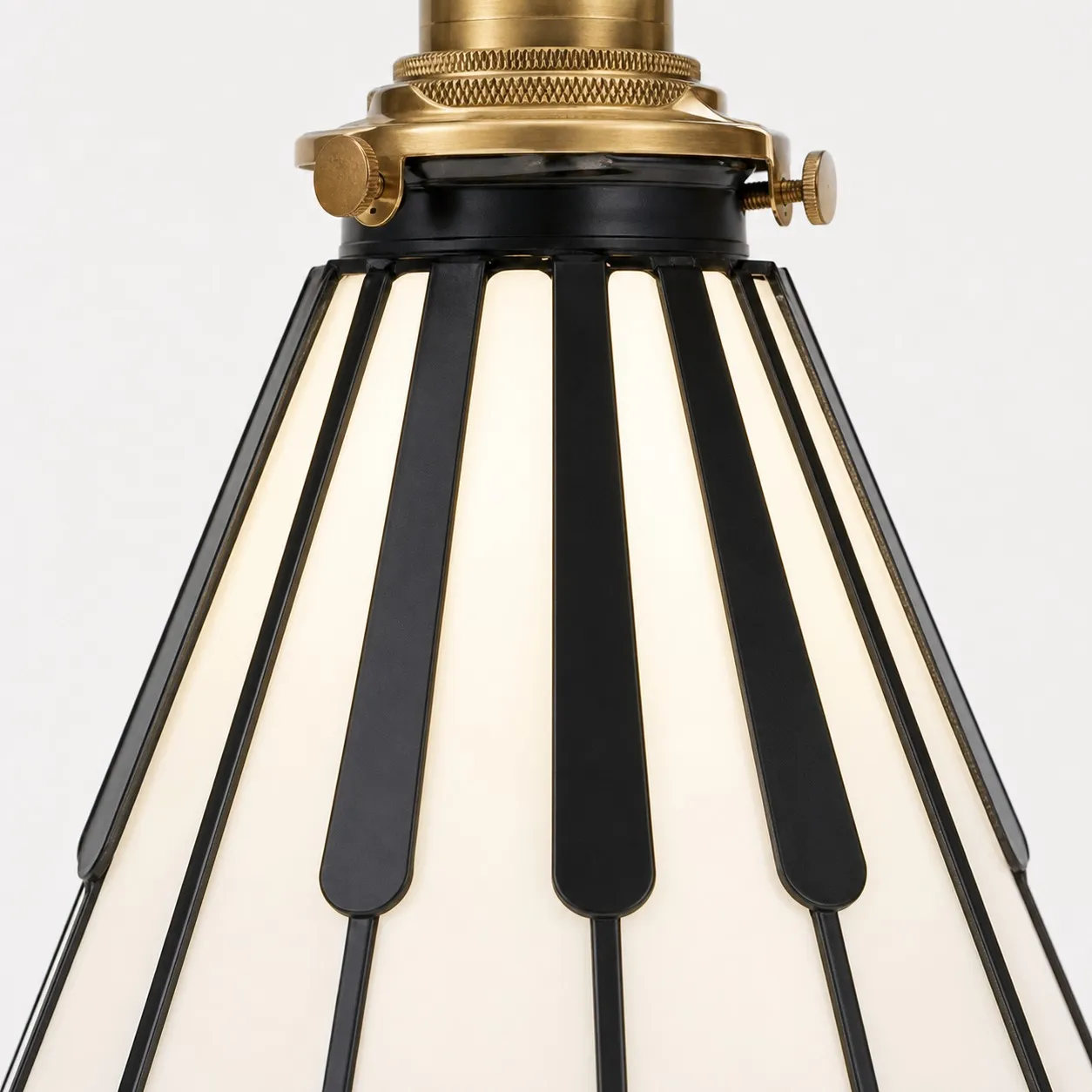 Black piano key frame around the glass shade