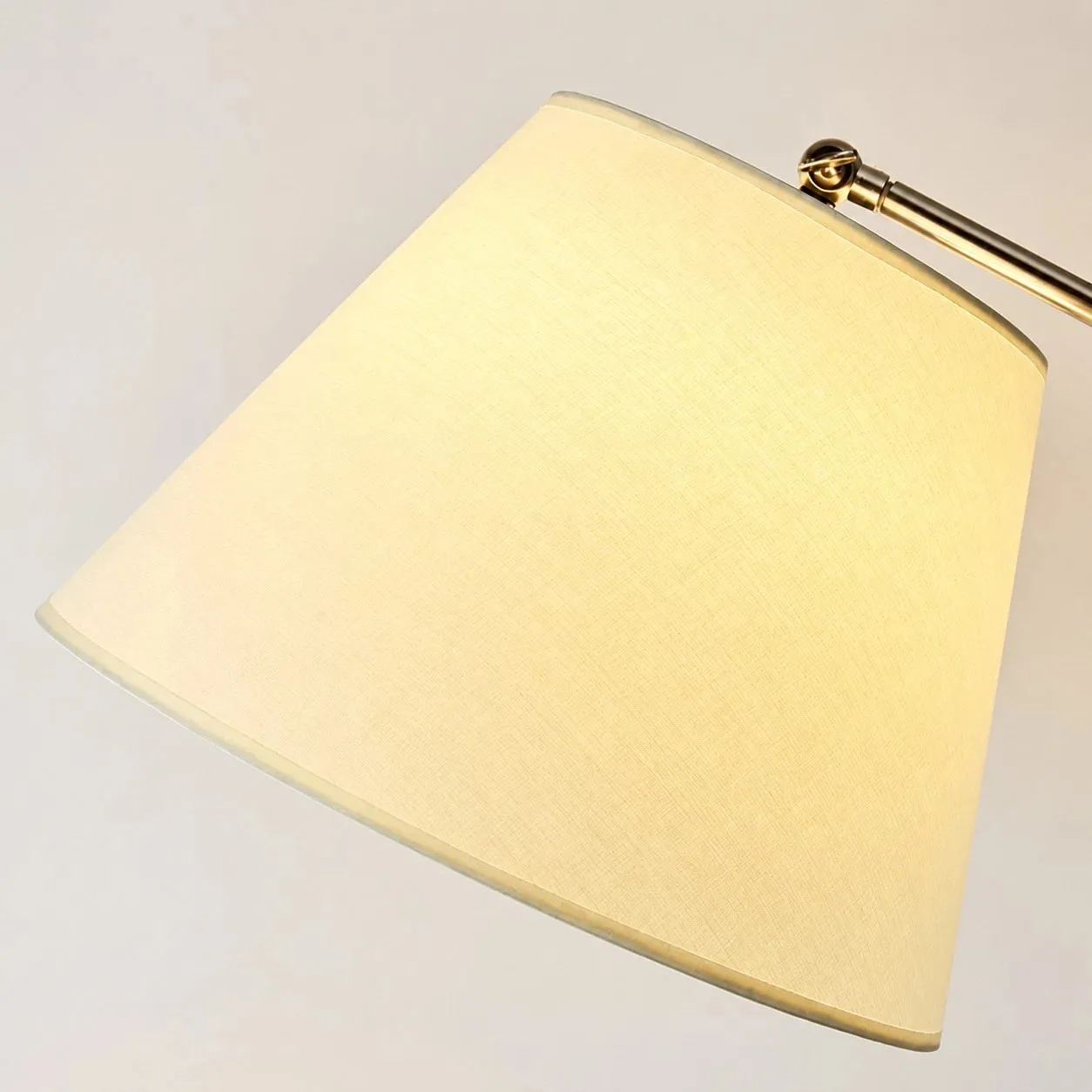 Warm fabric lampshade texture on the adjustable table lamp