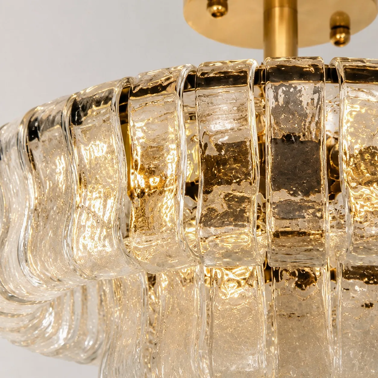 Close view of ripple glass panels on the chandelier