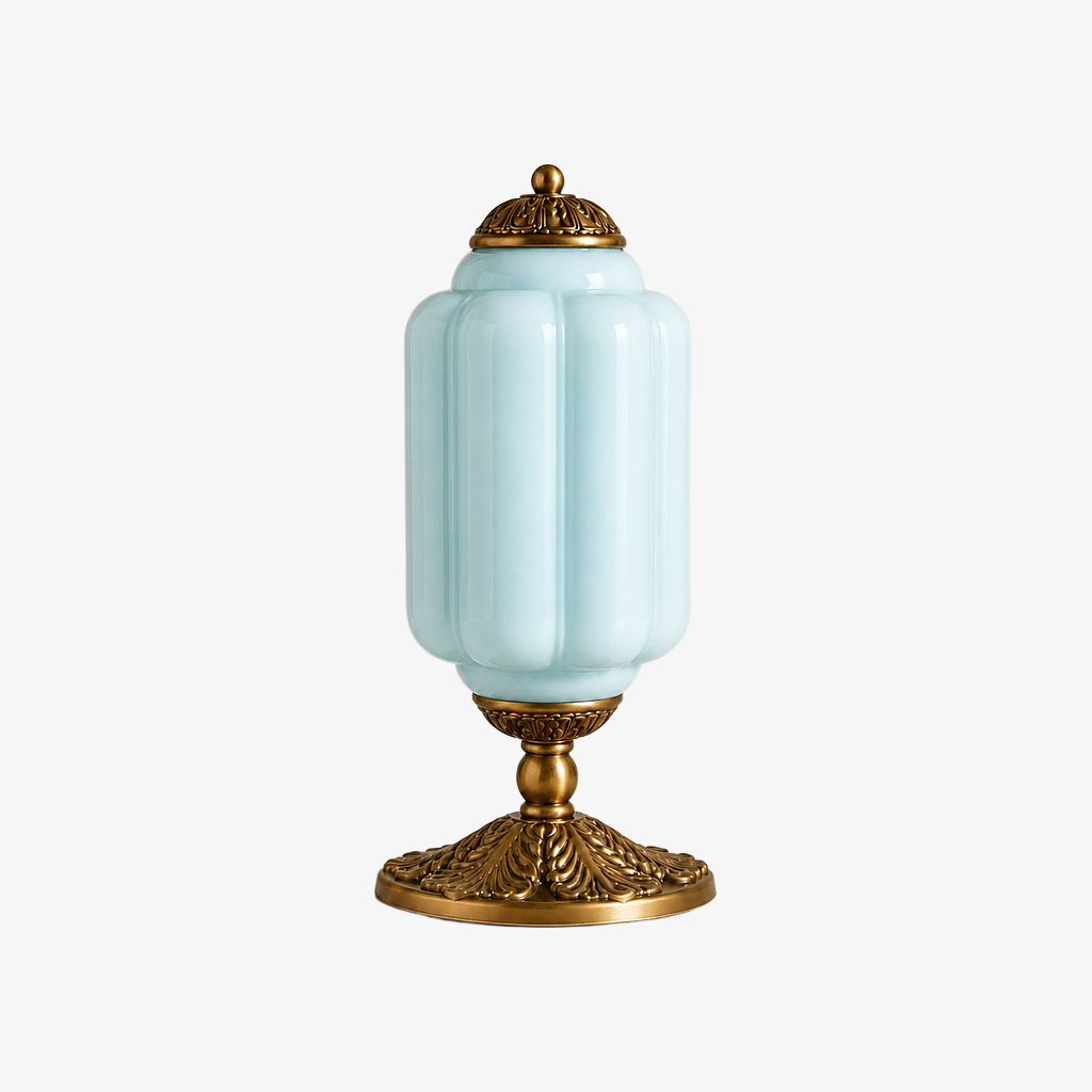 Blue scalloped glass table lamp with a brass base