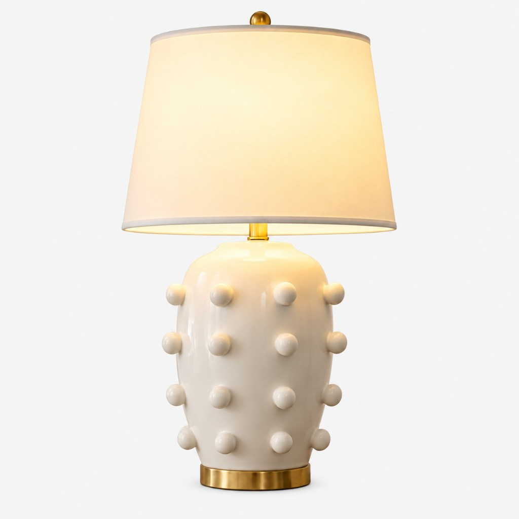 White raised-dot table lamp, 26 inches, with a brass base