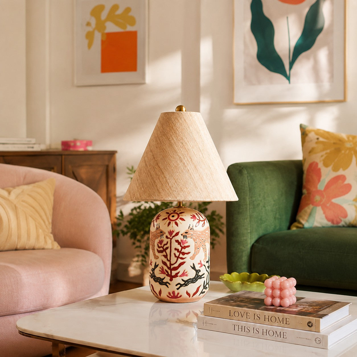 Pink tapered linen shade table lamp in a living room