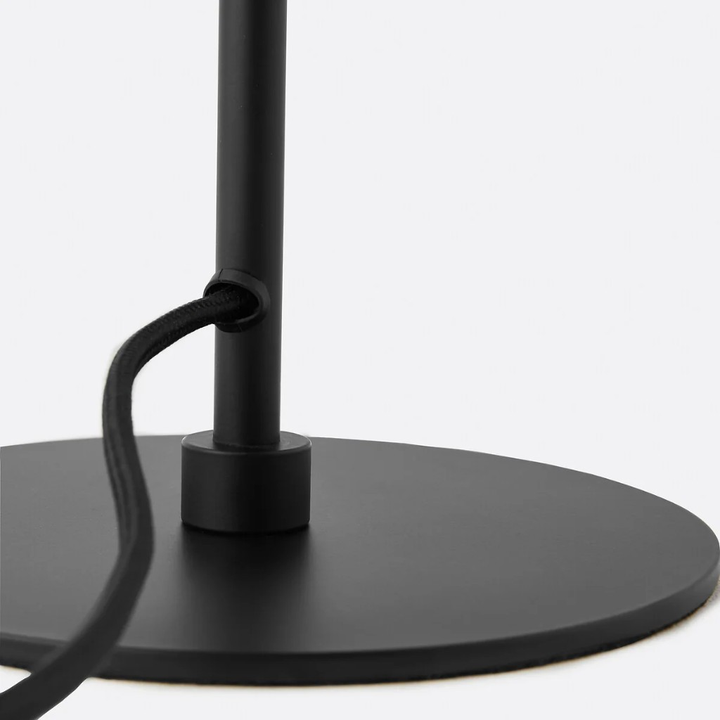 Black metal base and cord entry