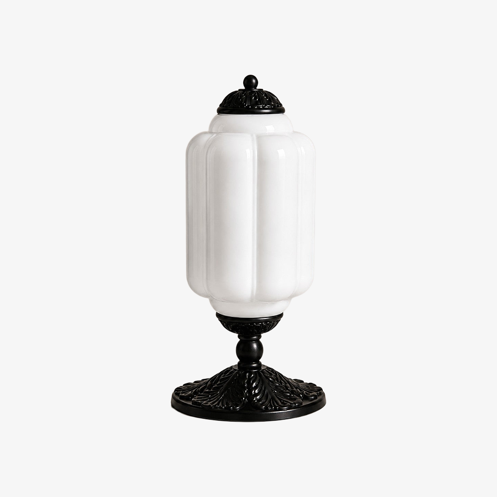 White scalloped glass table lamp with a black base
