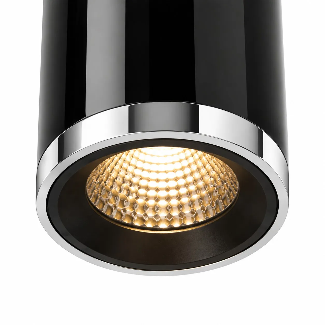 Glossy black ceiling lamp opening and chrome ring