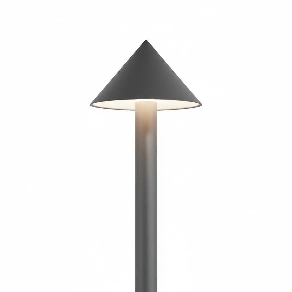Conical shade and warm light of a cordless table lamp