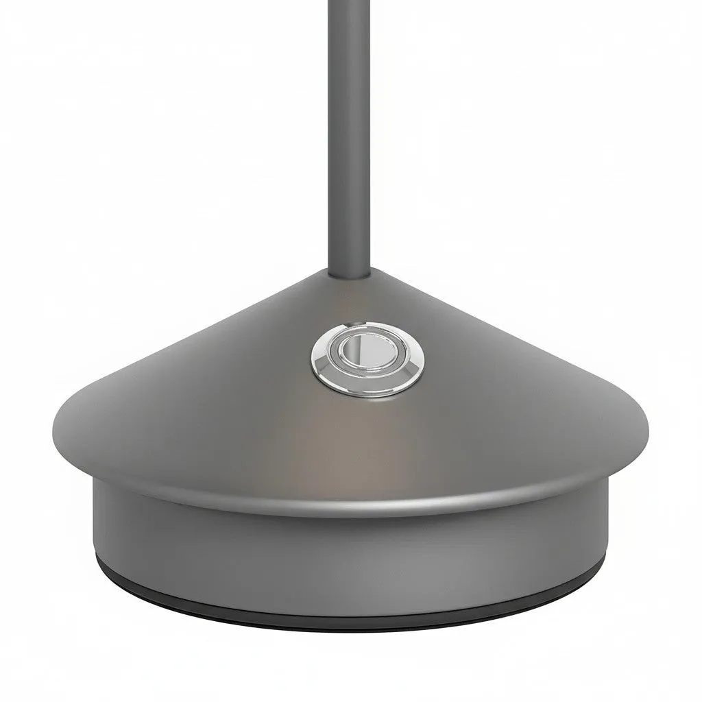 Touch button on the conical base of a cordless table lamp